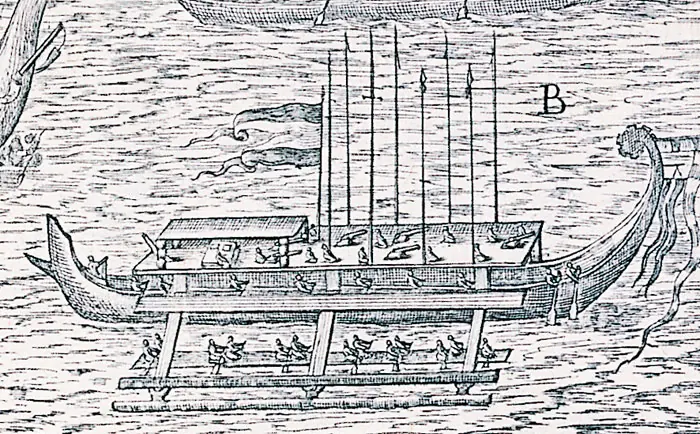 Un grand bateau à balancier, c'est-à-dire stabilisé par un flotteur fixé le long de sa coque, sur une gravure du recueil India Orientalis (de Bry, 1601). C'est un bateau de l'archipel indonésien, où se trouve Bornéo, l'île d'où la langue de Madagascar était venue six siècles plus tôt.
