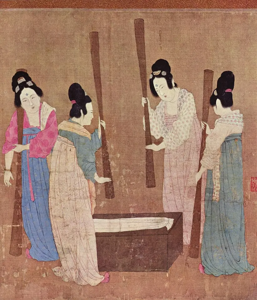 Court ladies pounding silk: detail of a Song dynasty painting attributed to the emperor Huizong, in the style of Zhang Xuan, a painter of the earlier Tang dynasty.