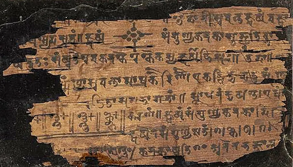 A leaf of the Bakhshali manuscript, in which zero is written as a small dot.